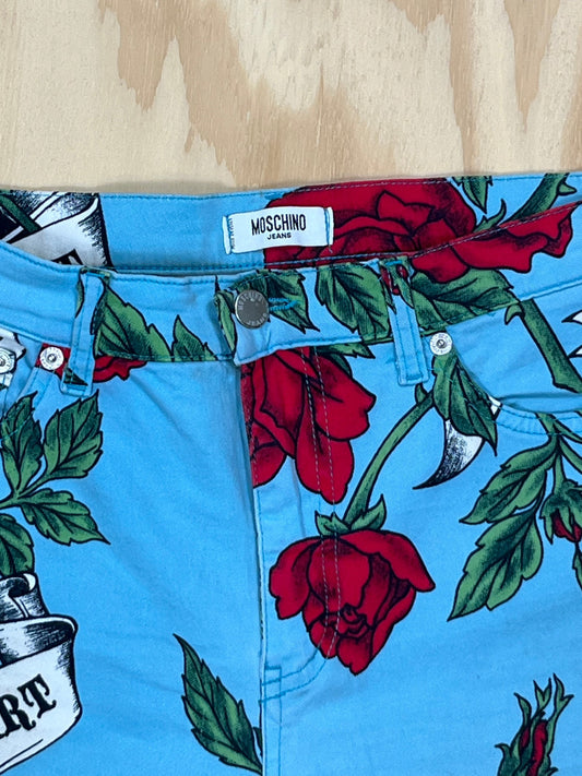 Close-up of Moschino Jeans label and floral rose print fabric detail.