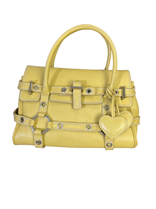 Vintage Luella Gisele bag in yellow grained leather with silver hardware, buckle details, and signature heart charm, iconic early 2000s It-bag.