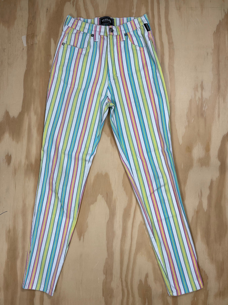 Front view of 1990s Versace Jeans Couture rainbow striped pants in slim high-rise cut.