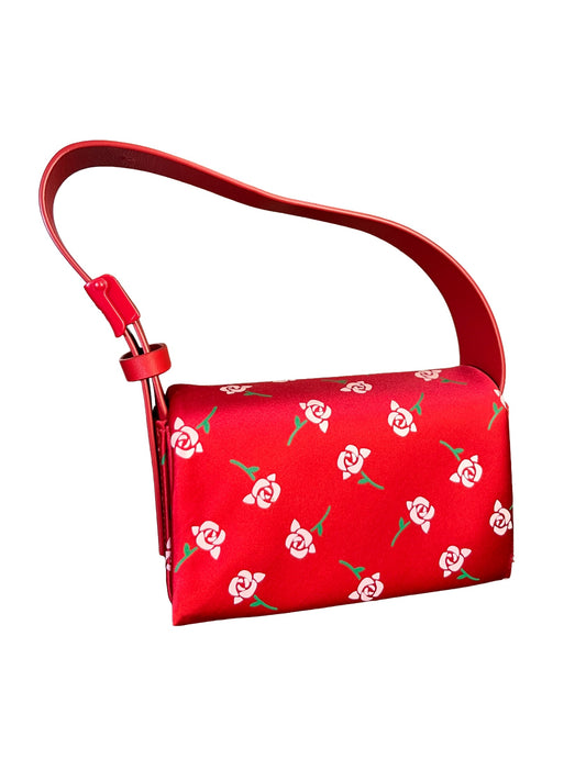 Shushu/Tong red satin mini bag with white rose print, structured silhouette, and red leather strap from the 2022 collection.