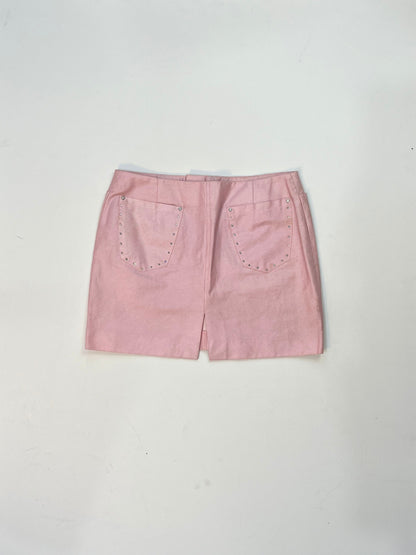 Back view of vintage Versace pink mini skirt with rhinestone studded patch pockets.