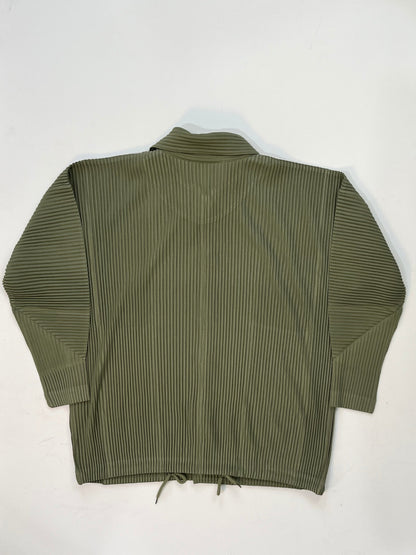 Issey Miyake Homme Plissé black pleated hoodie with drawstring hood, snap-button neckline, and kangaroo pocket.