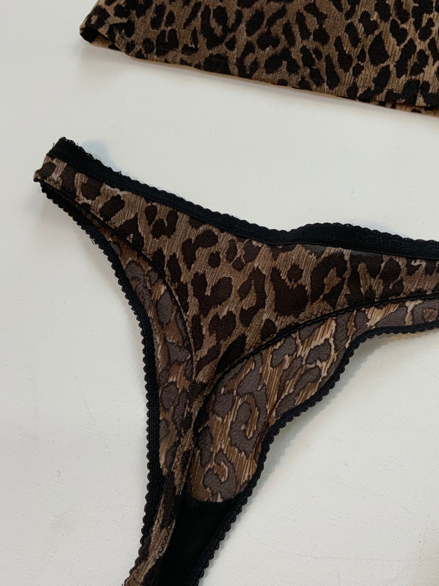 Vintage Dolce & Gabbana leopard print camisole and matching thong lingerie set, unworn.