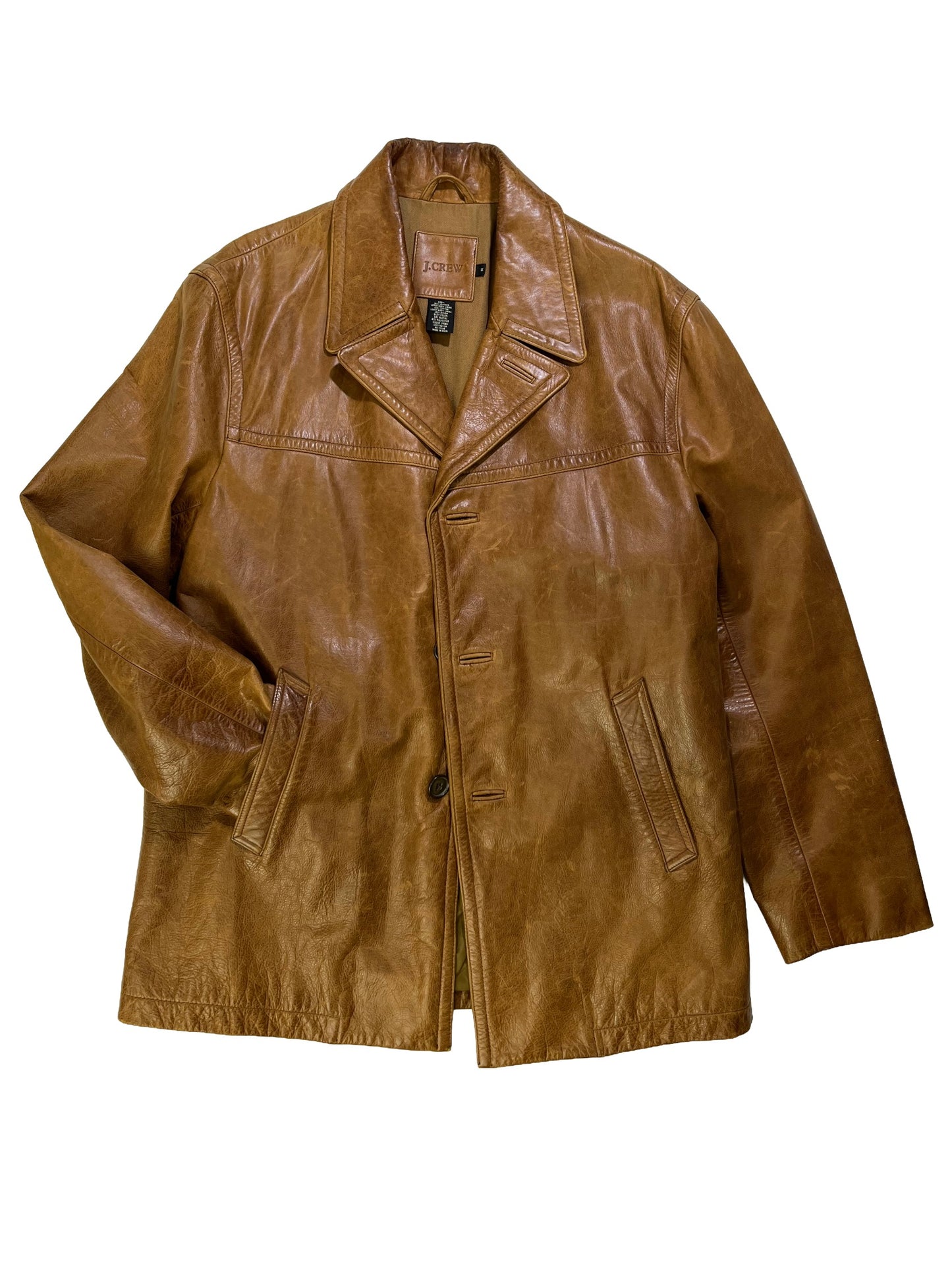 Vintage 1990s J.Crew brown cowhide leather jacket with natural patina, wide lapel collar, and button-front closure.