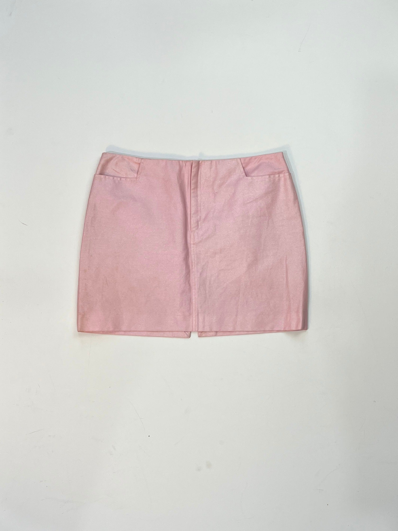 Front view of Versace pink mini skirt in glossy leather-look fabric, early 2000s Y2K style.