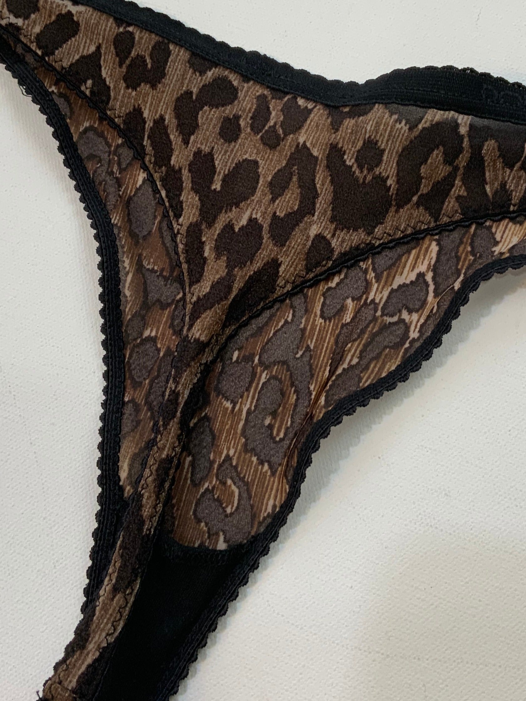 Vintage Dolce & Gabbana leopard print camisole and matching thong lingerie set, unworn.
